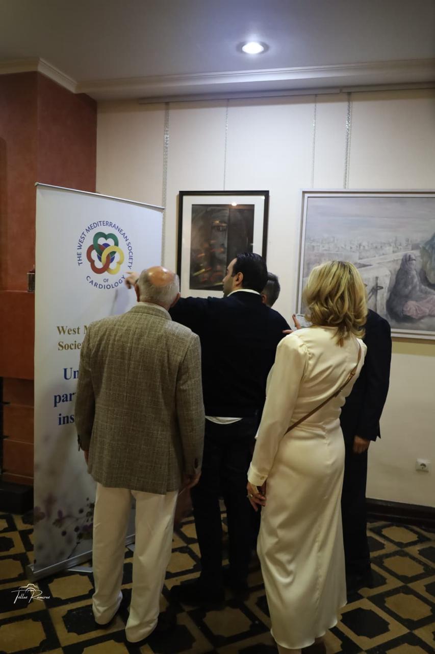 Guests viewing artworks at the Marbella charity event