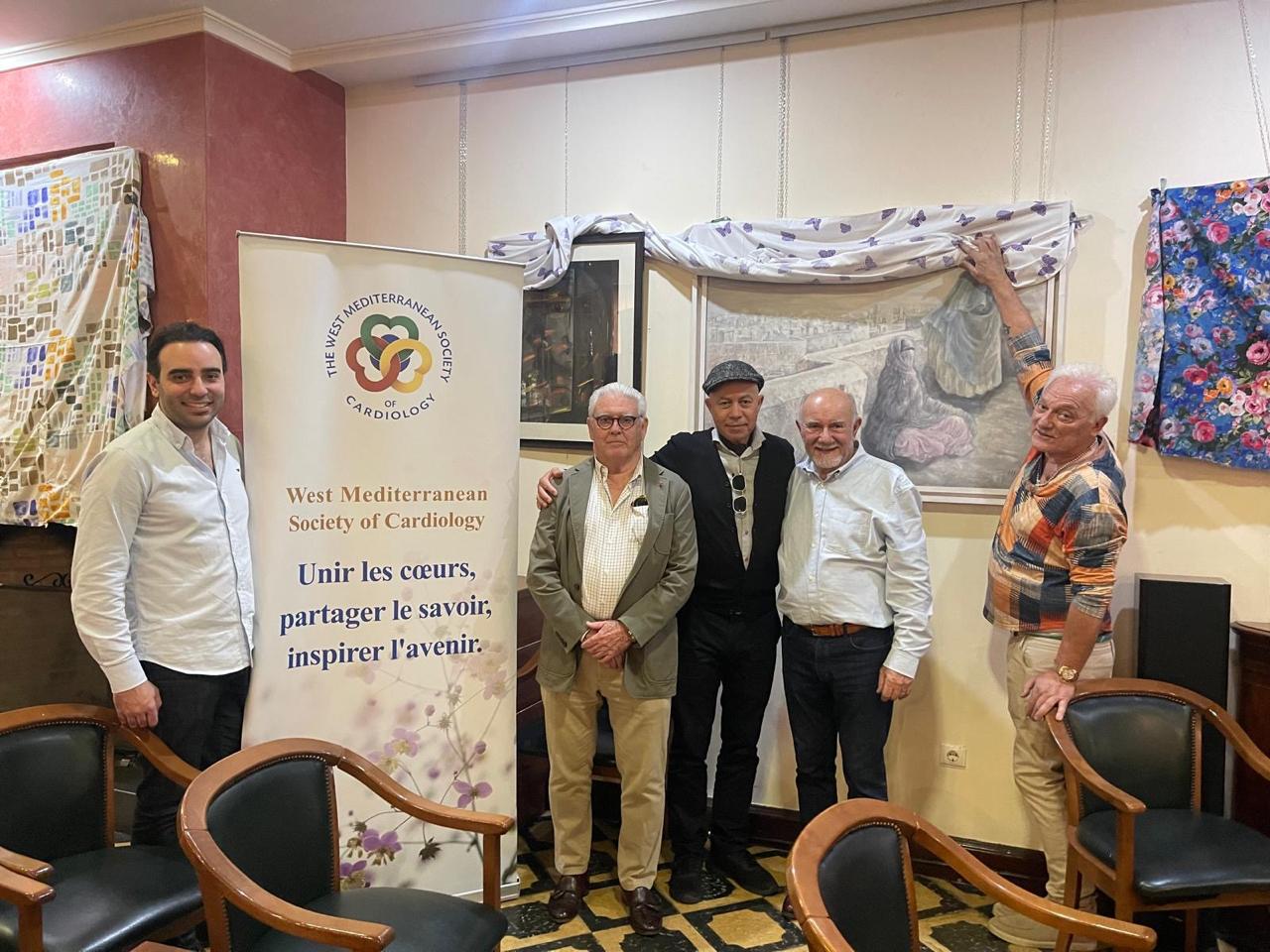 Unveiling of an artwork at the WMSC charity art exhibition in Marbella