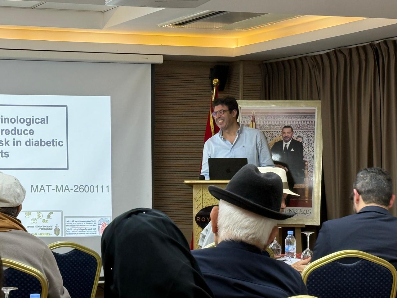 Speaker addressing the audience at the fourth WMSC scientific meeting